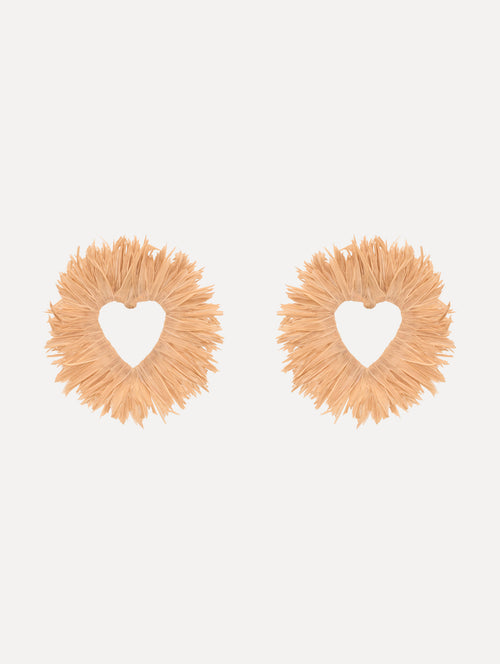 The Raffia Heart Earrings with heart cut-out center. Front View.