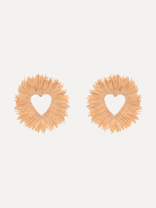 The Raffia Heart Earrings with heart cut-out center. Front View.