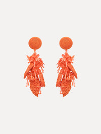 The Raffia Tassel Bouquet Clip-On Earrings in Orange. Front View.