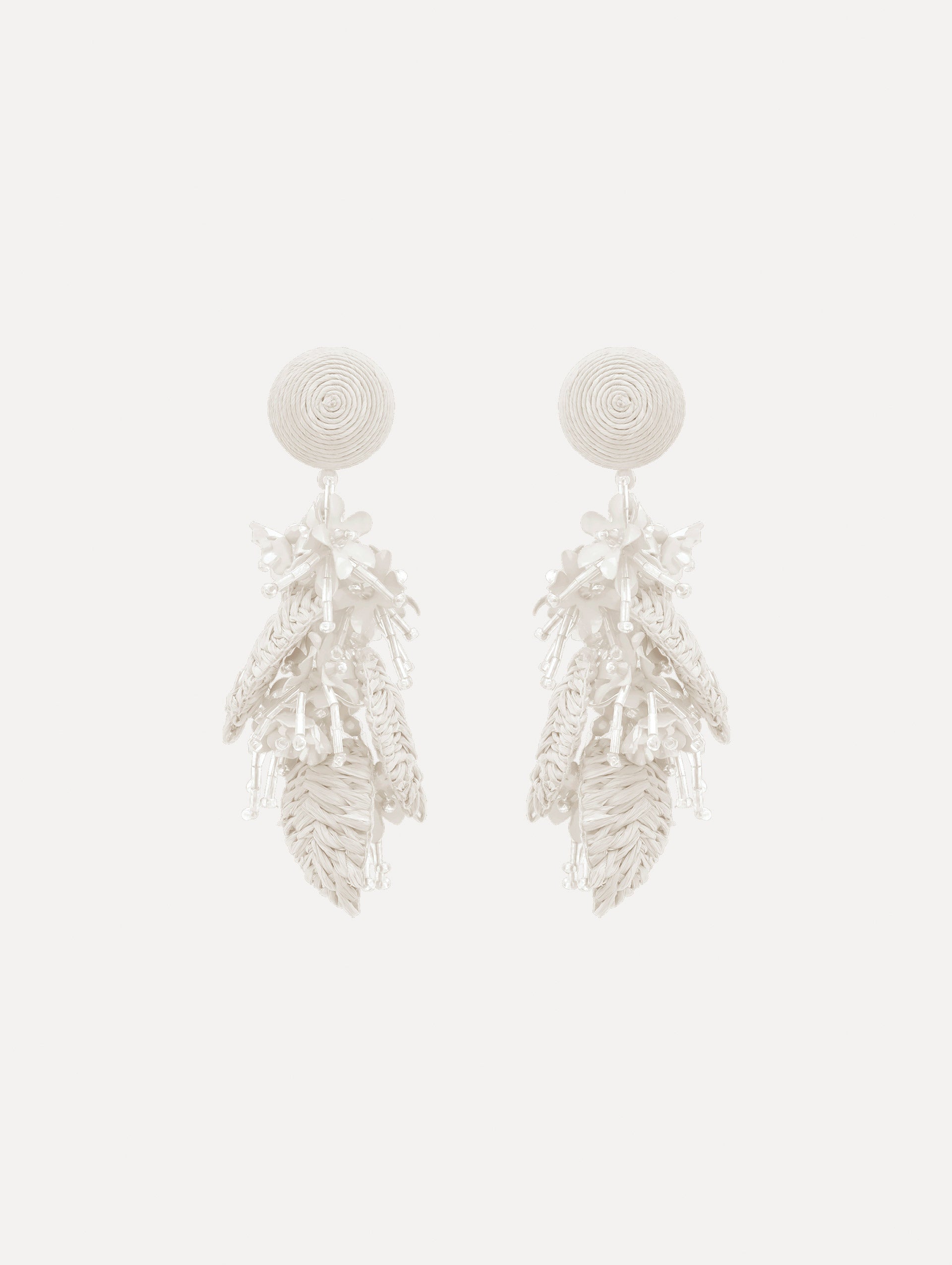 The Raffia Tassel Bouquet Clip-On Earrings in White. Front View.
