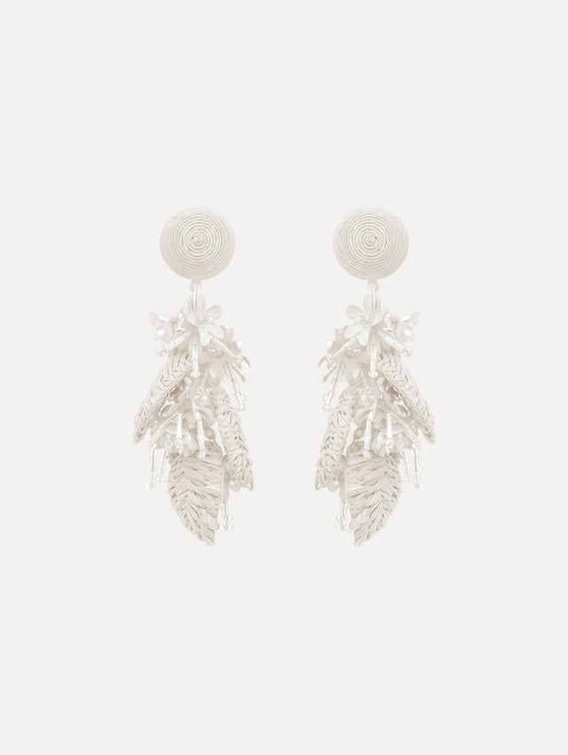 The Raffia Tassel Bouquet Clip-On Earrings in White. Front View.
