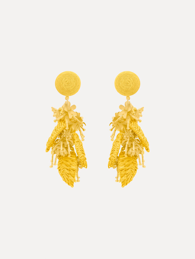 The Raffia Tassel Bouquet Clip-On Earrings in Yellow. Front View.