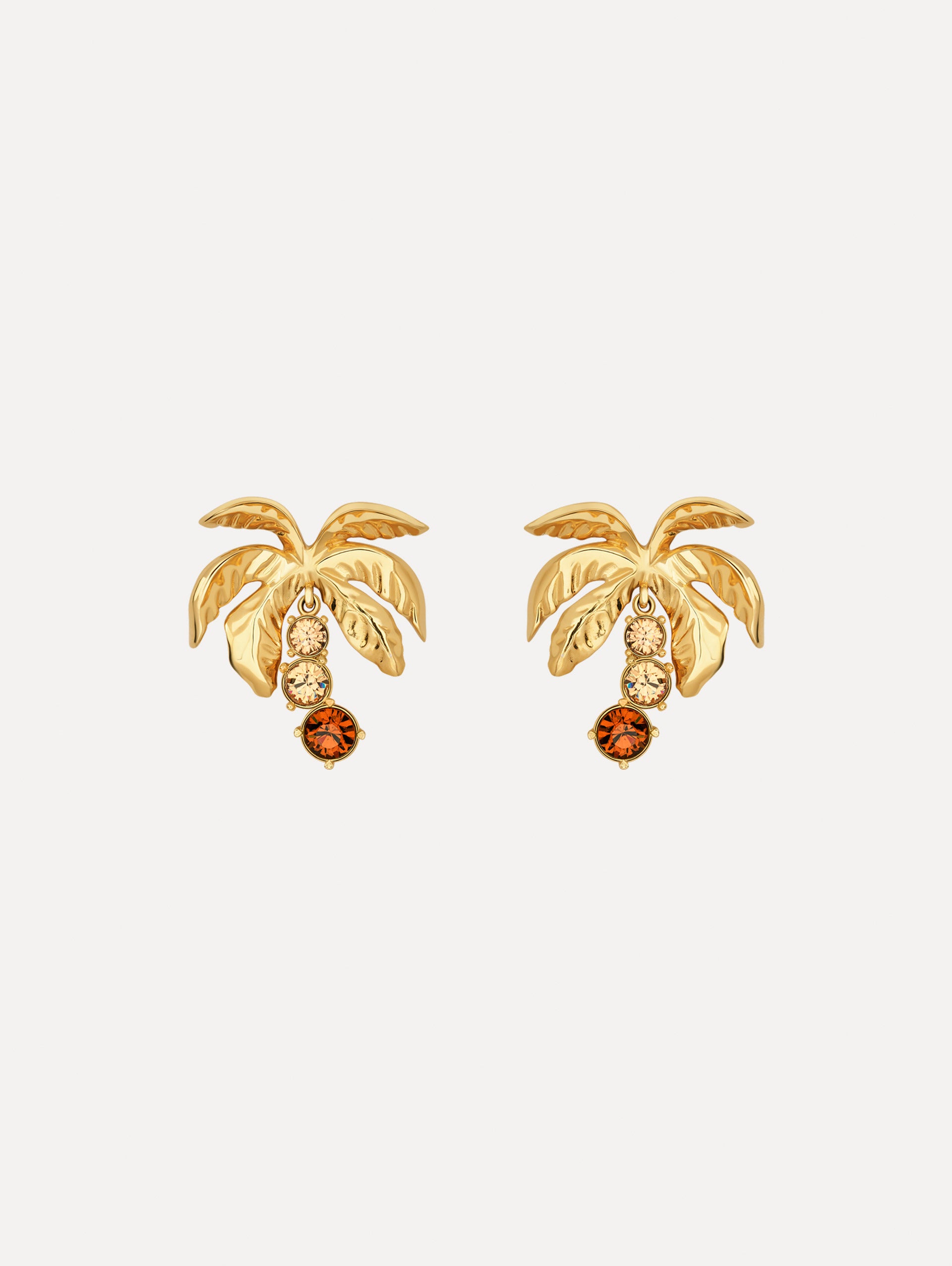 The Palm Tree Crystal Clip-On Earrings in Gold with Crystal Trunks. Front View.