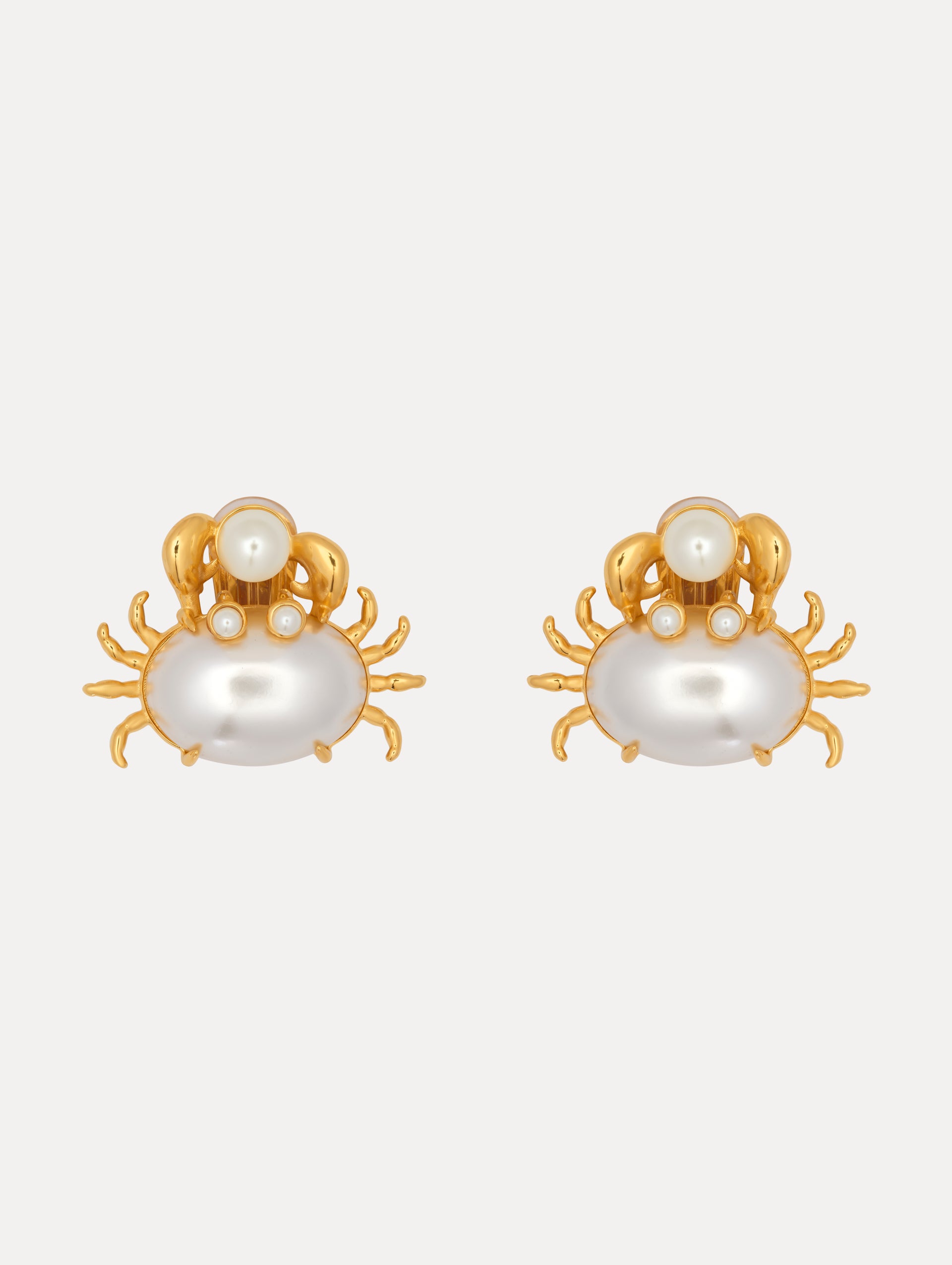 Gold Crab with pearl Shell holding Pearl Post Back Earrings. Front View.