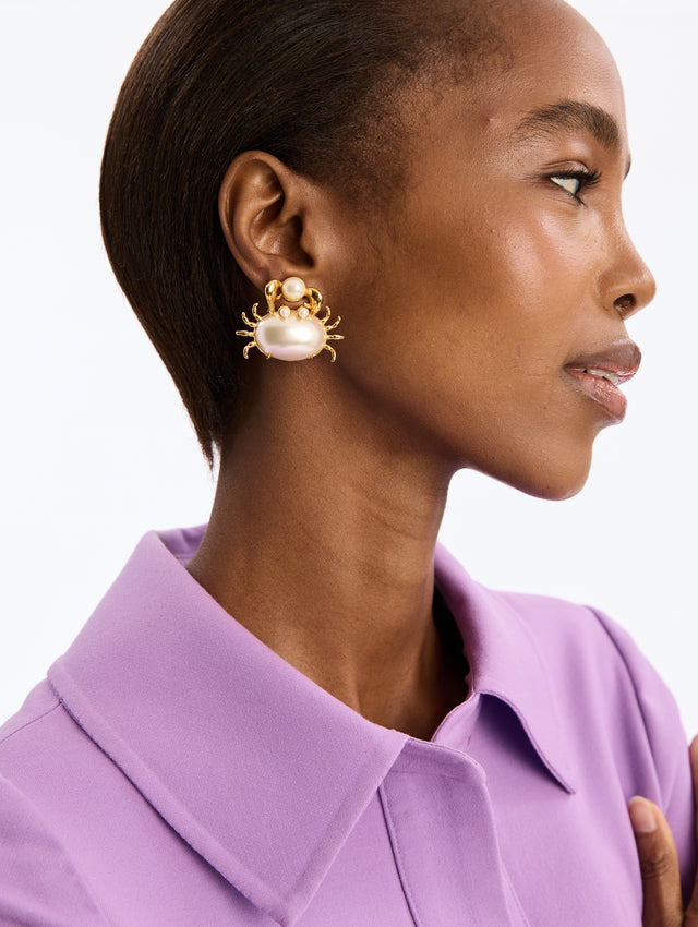 Gold Crab with pearl Shell holding Pearl Post Back Earrings. Front View.