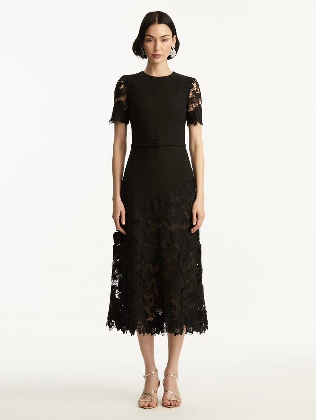 Black Orchid Guipure Lace Inset Short Sleeve Dress with Transparencies in Sleeves and Bottom, and Black Belt. Front View