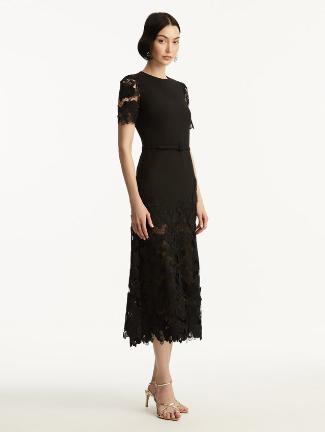 Black Orchid Guipure Lace Inset Short Sleeve Dress with Transparencies in Sleeves and Bottom, and Black Belt. Side View