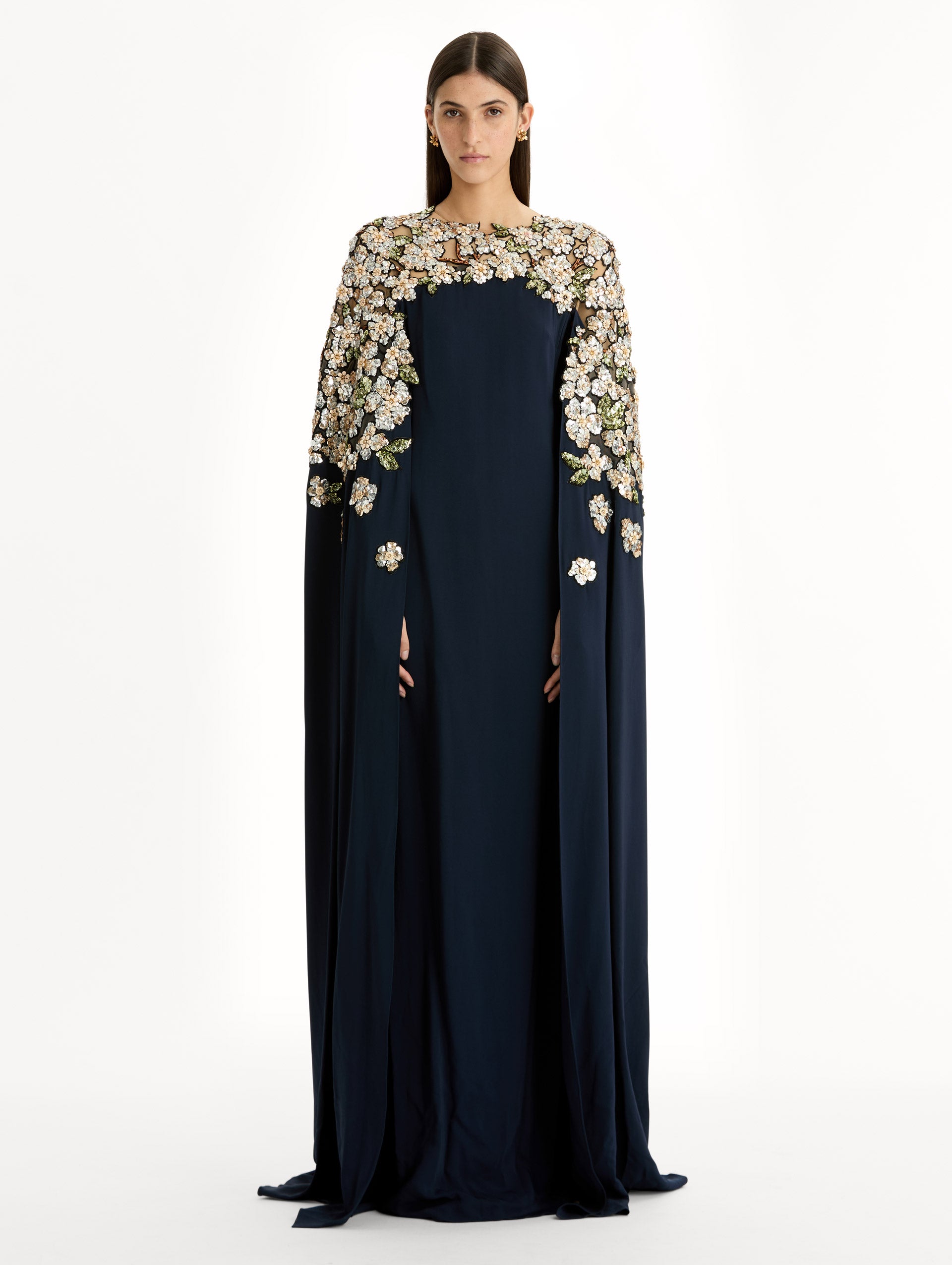 Navy Floral Sequin Embroidered Caftan with floor length caped sleeves and floral sequin embroidery. Front View.