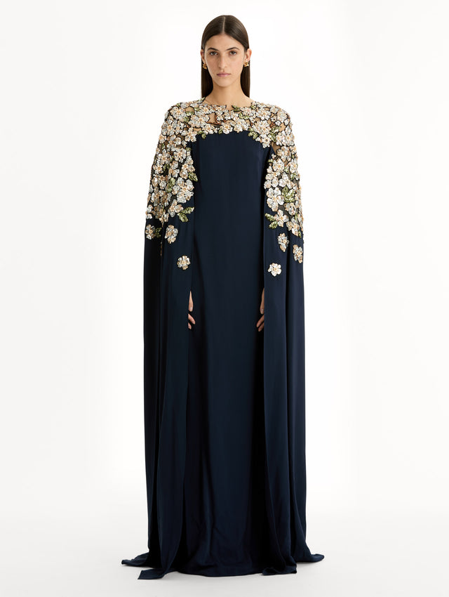 Navy Floral Sequin Embroidered Caftan with floor length caped sleeves and floral sequin embroidery. Front View.
