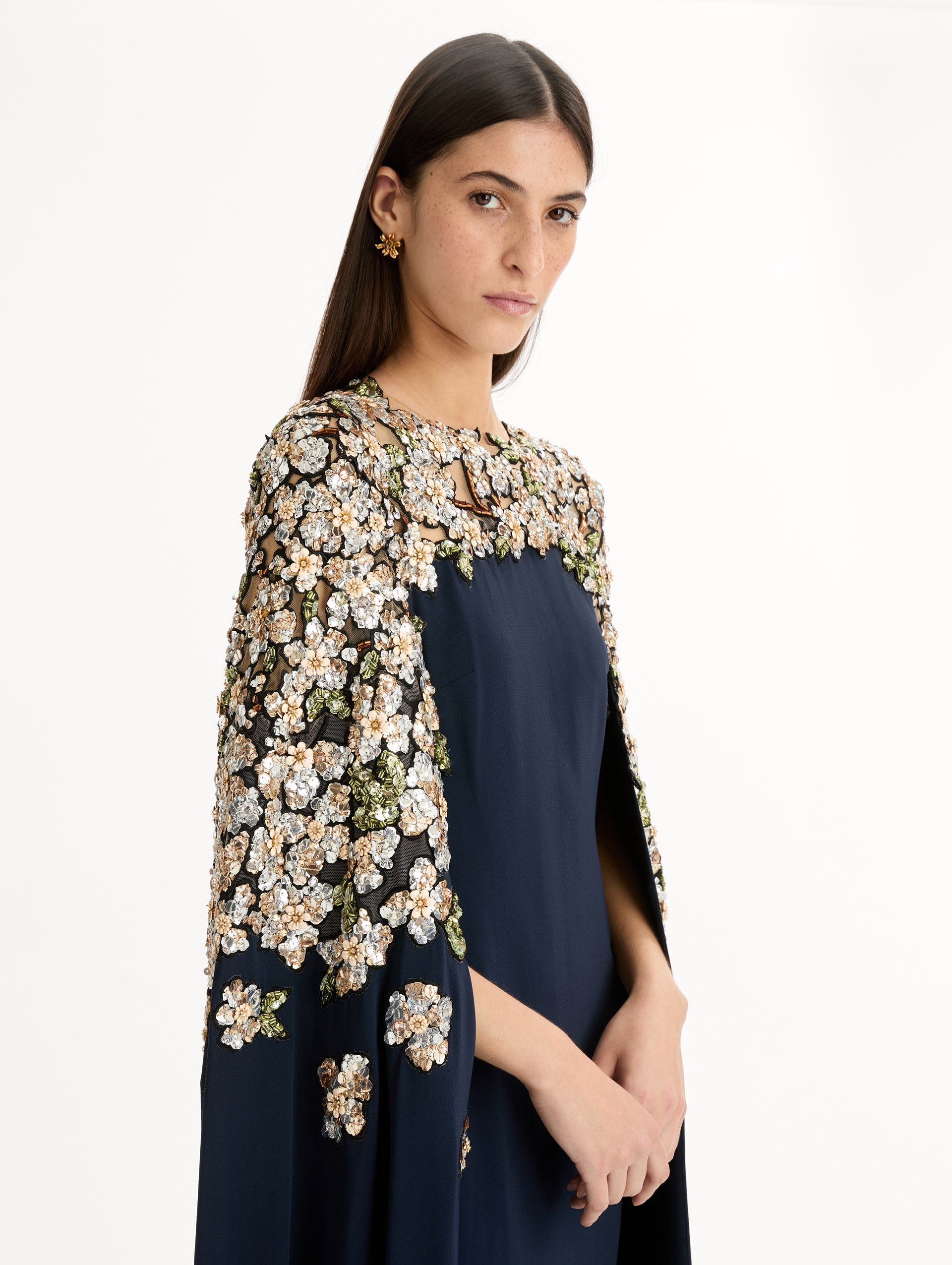 Navy Floral Sequin Embroidered Caftan with floor length caped sleeves and floral sequin embroidery. Zoom View.