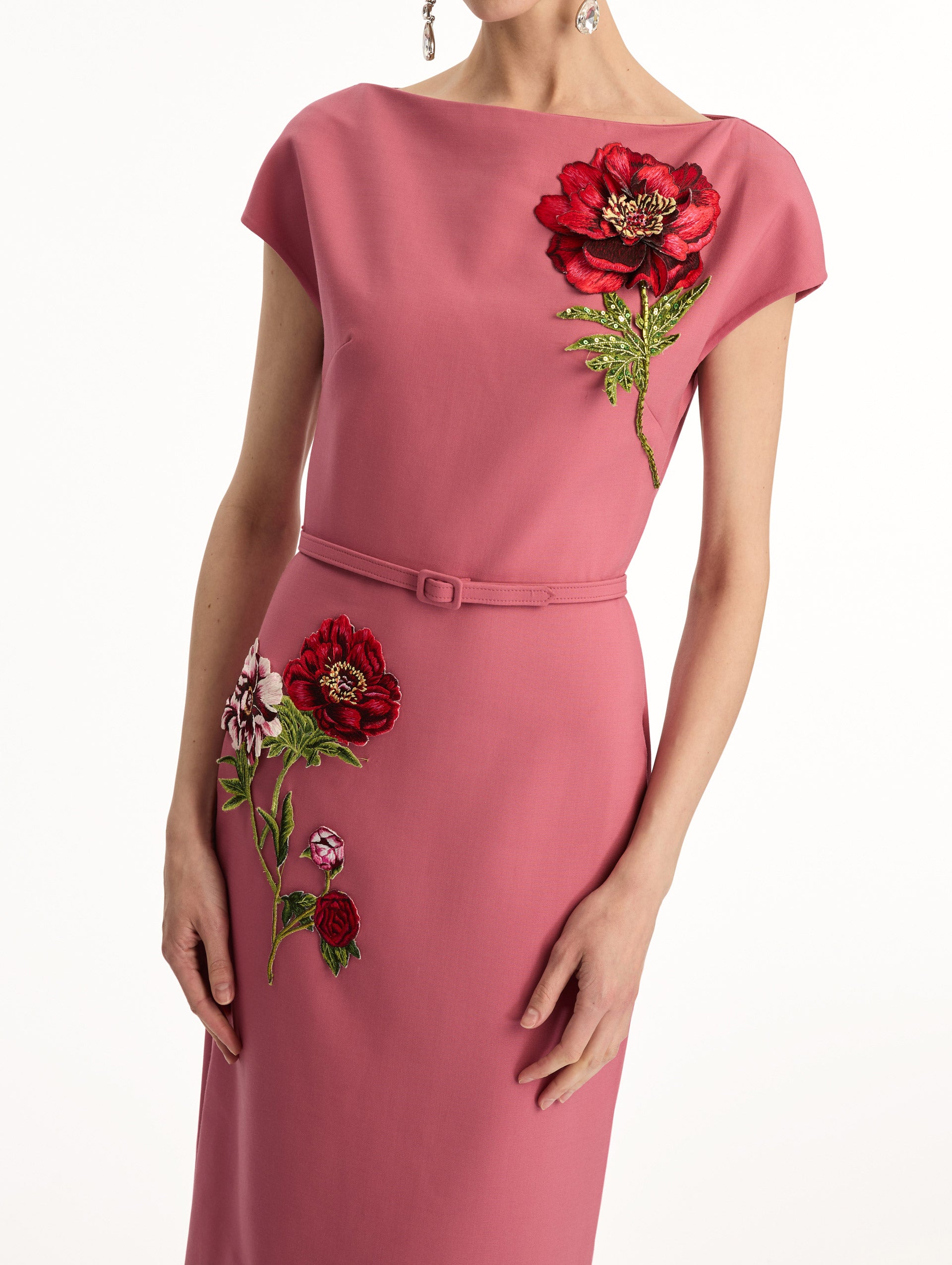 Pink cap sleeve dress with printed red and pink peonies and a matching self-belt. Zoom View.