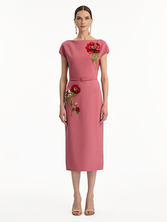 Pink cap sleeve dress with printed red and pink peonies and a matching self-belt. Front View.