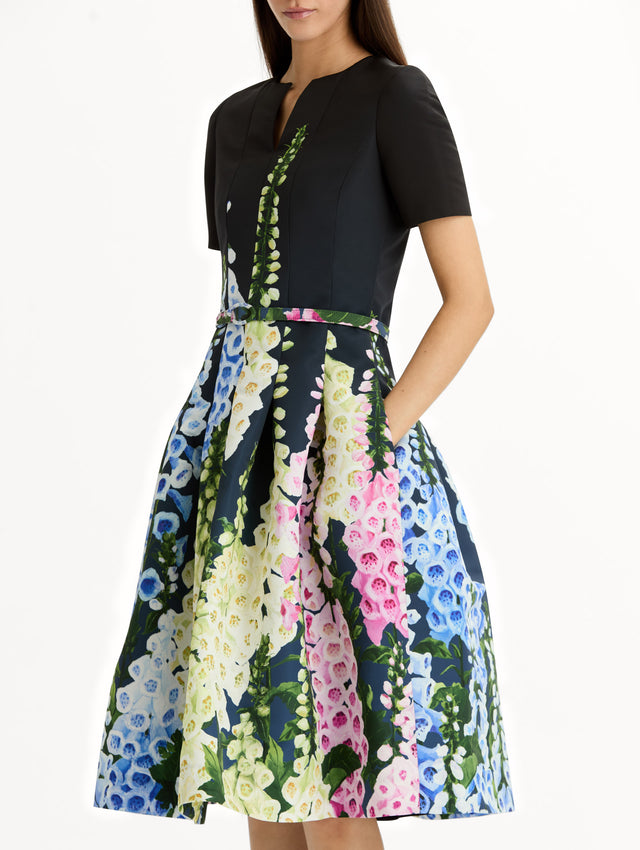 Black floral Degradé Foxglove Split-Neck Dress with belted waist and short sleeves. Zoom View.