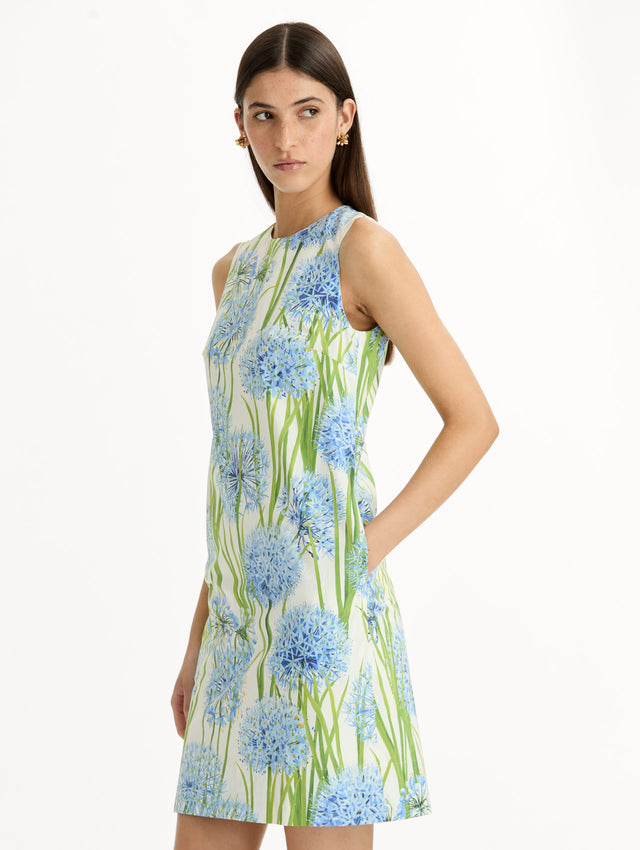 Ivory Allium Cotton Poplin Sleeveless Shift Dress with blue and green floral allium print. Zoom View.