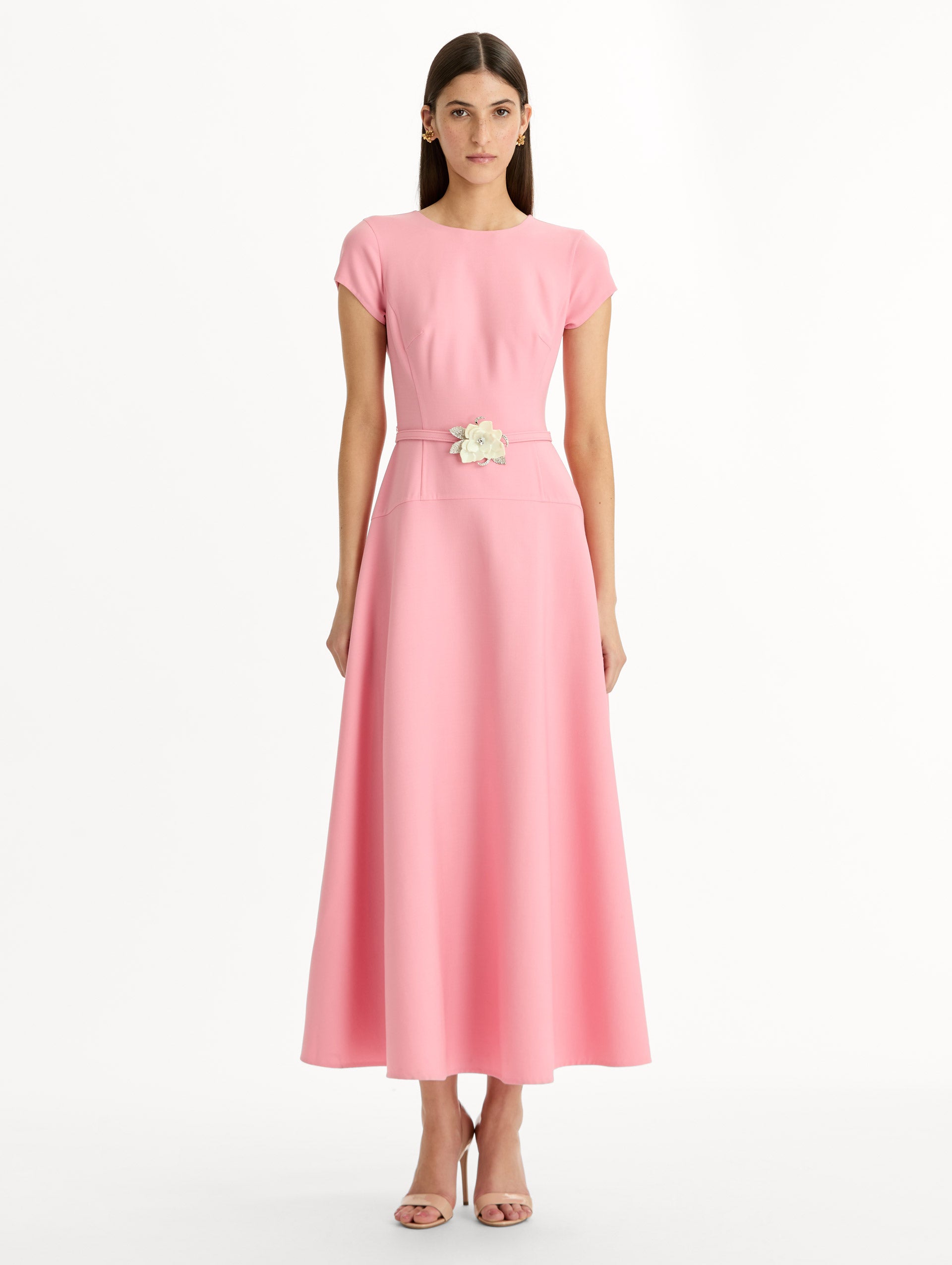 Pink Floral Belt Short Sleeve Dress with short sleeves and a belted waist featuring a white floral accent. Front View.