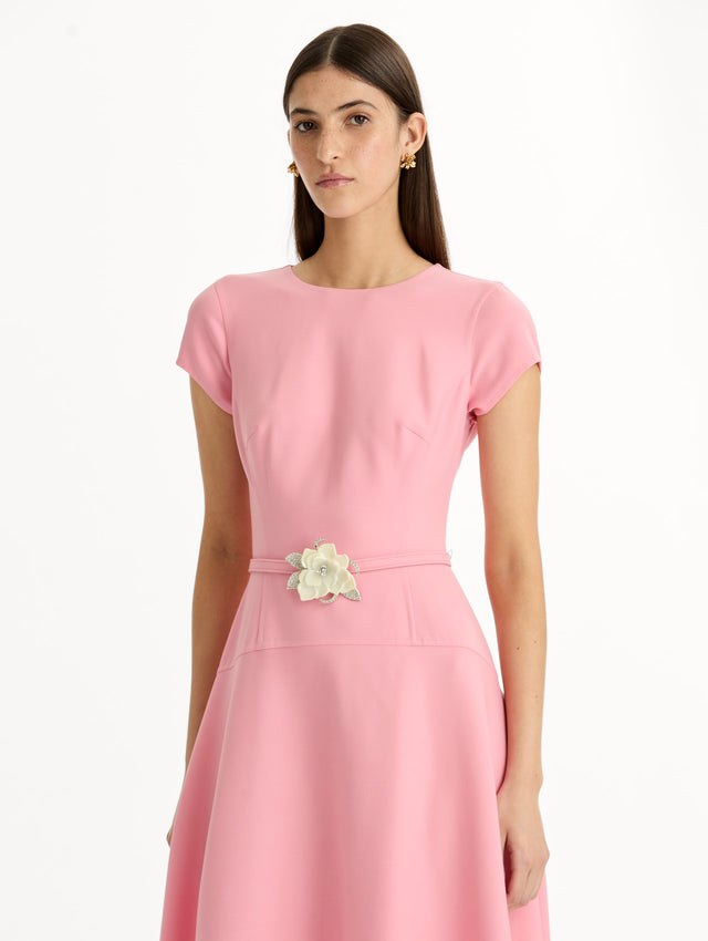 Pink Floral Belt Short Sleeve Dress with short sleeves and a belted waist featuring a white floral accent. Zoom View.