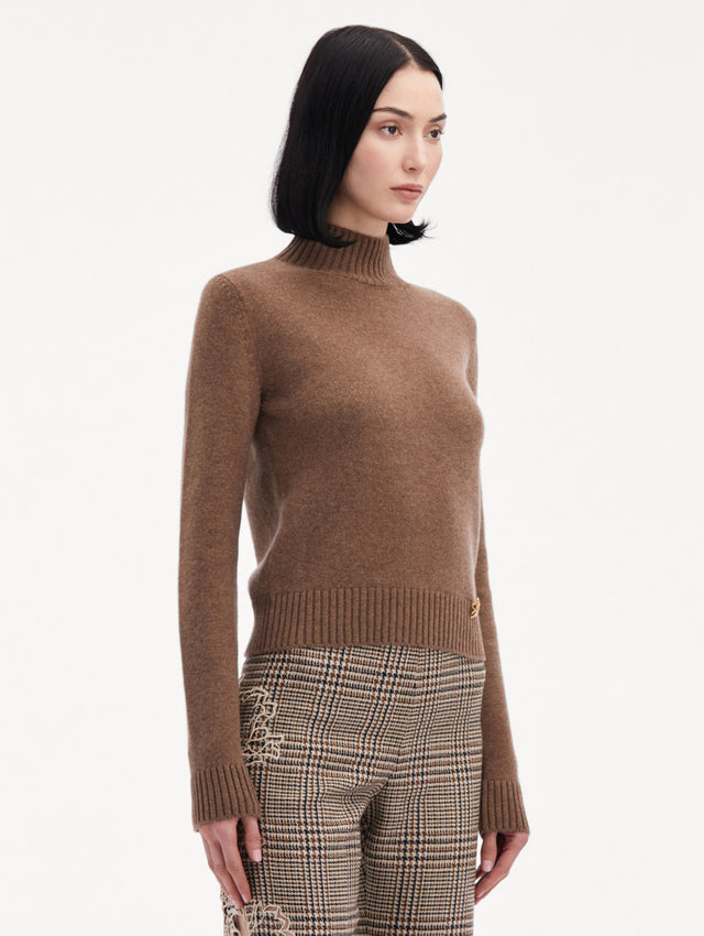 Brown O Flower Mock Neck Cashmere Pullover Paired with Plaid Pants Side View
