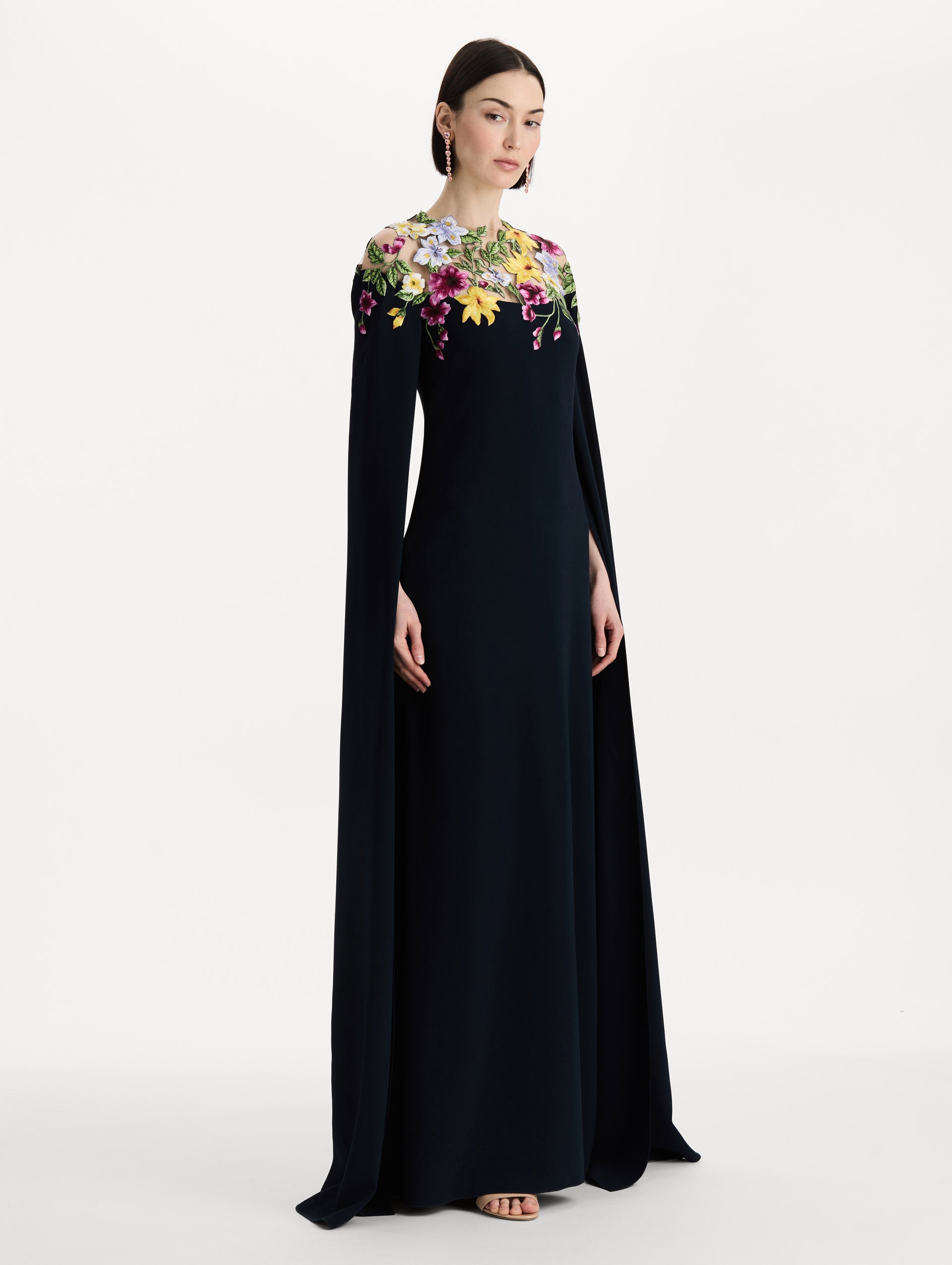 Dominican Mixed-Floral Caftan in navy. side view.