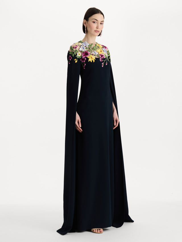 Dominican Mixed-Floral Caftan in navy. side view.