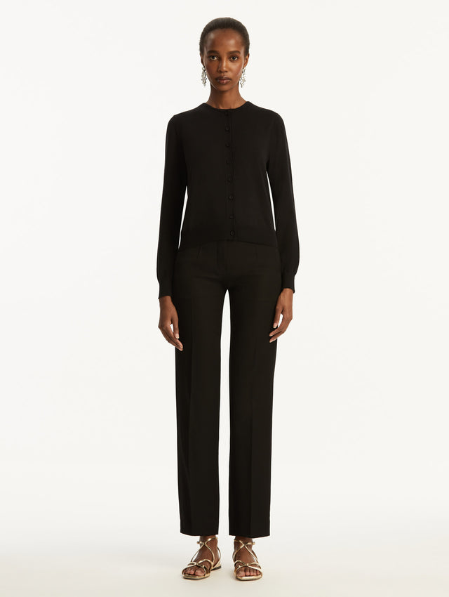 Wool-Blend Black Button-Down Cardigan Styled with Black Pants Front View