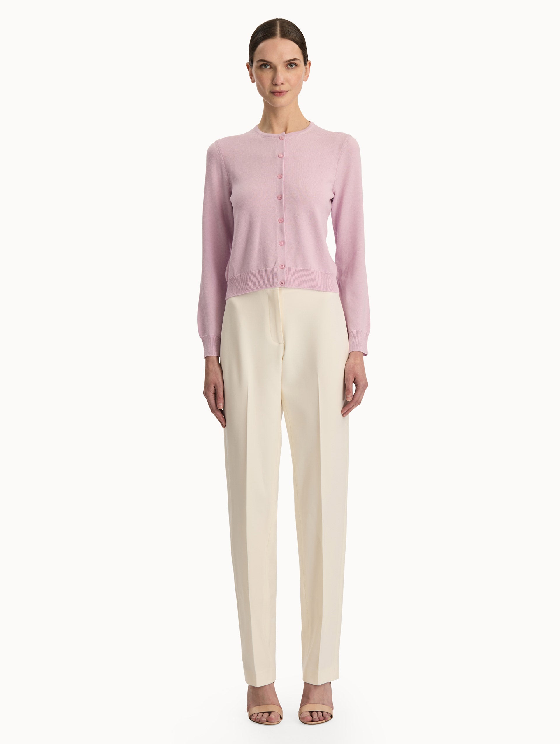 Front view of a pink wool cardigan.  Front View.