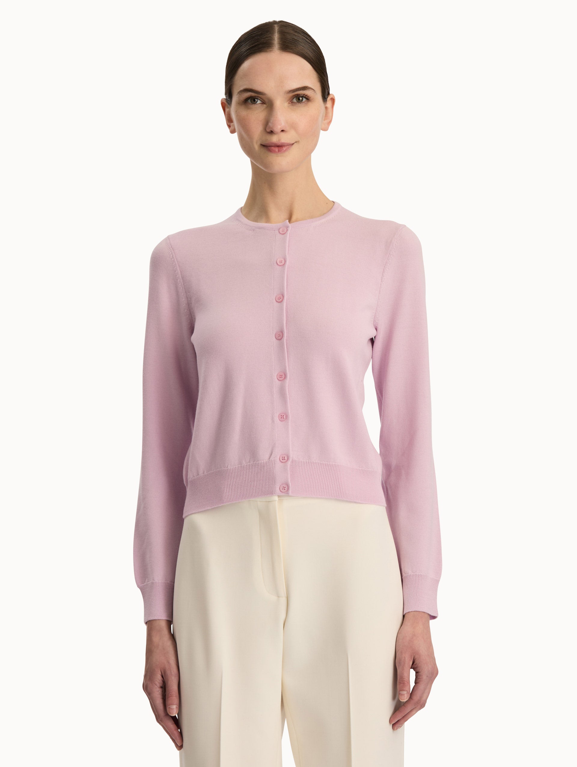 Front view of a pink wool cardigan.  Front View.