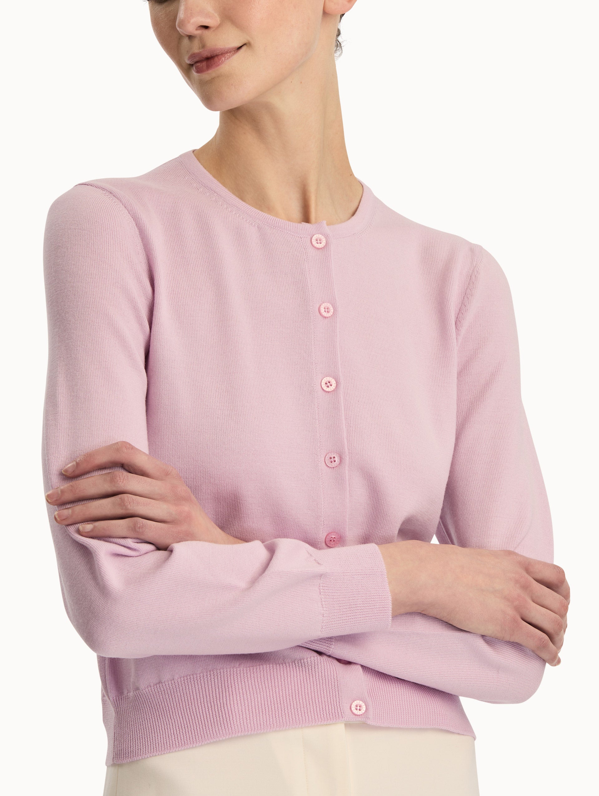 Front view of a pink wool cardigan.  Zoom View.