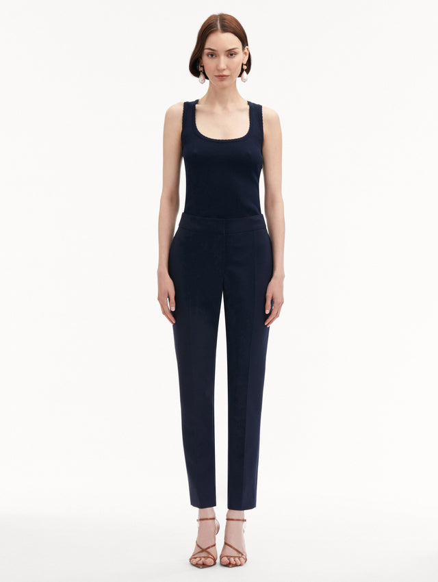 Navy Zip-Front Skinny Pant Paired with Navy Tank Front View