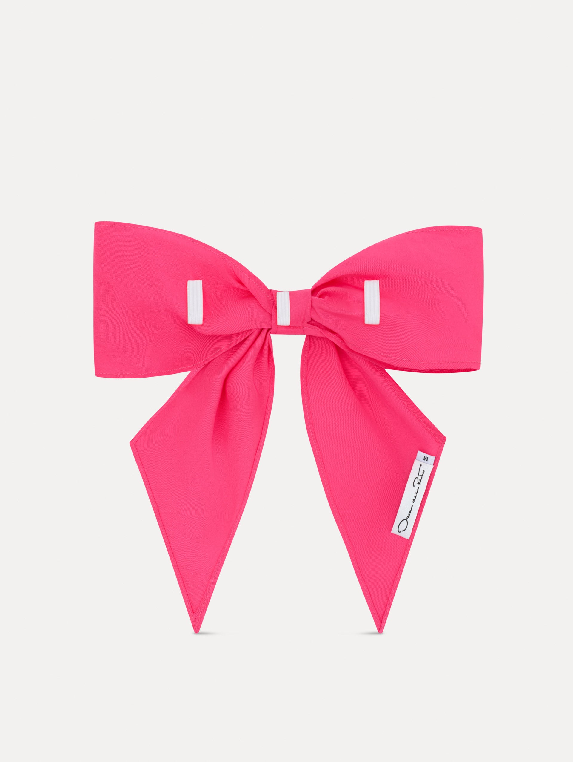 Bright Pink ODLR x @SimonSits Dog Bow featuring an oversized shape and long pointed tails. Back View.