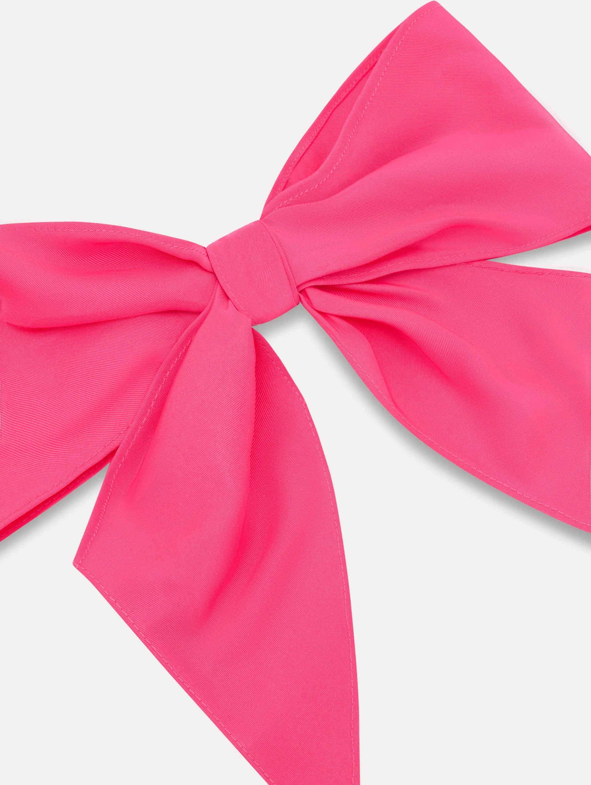 Bright Pink ODLR x @SimonSits Dog Bow featuring an oversized shape and long pointed tails. Zoom View.