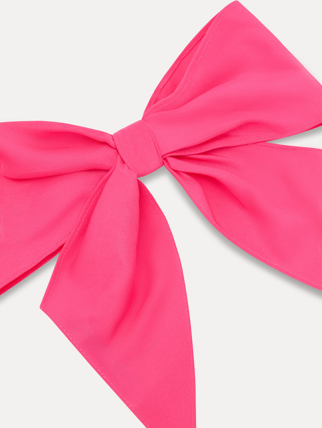 Bright Pink ODLR x @SimonSits Dog Bow featuring an oversized shape and long pointed tails. Zoom View.