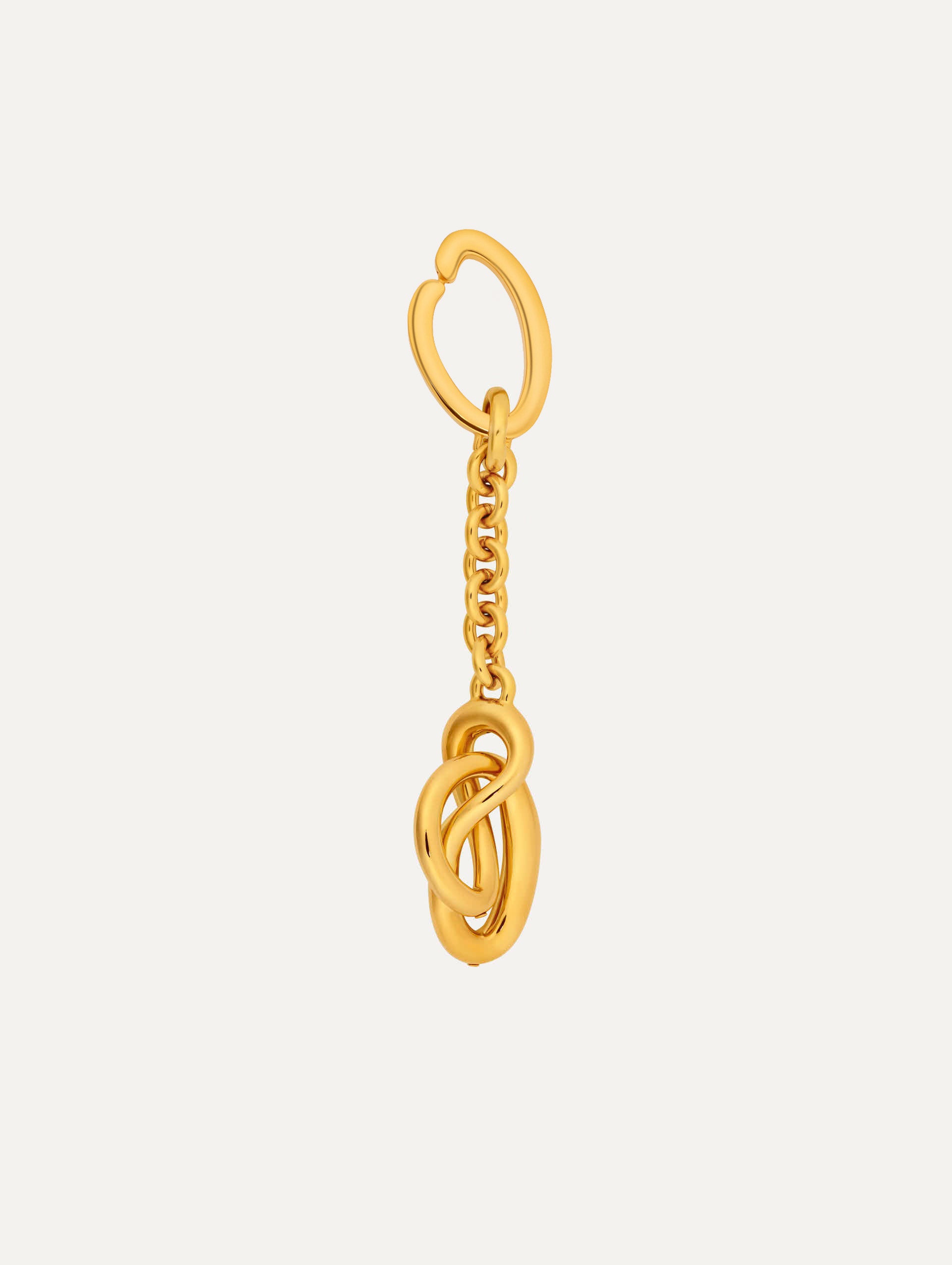 Gold Knotted Bag Charm with chain drop ending in an interlocking knot charm.