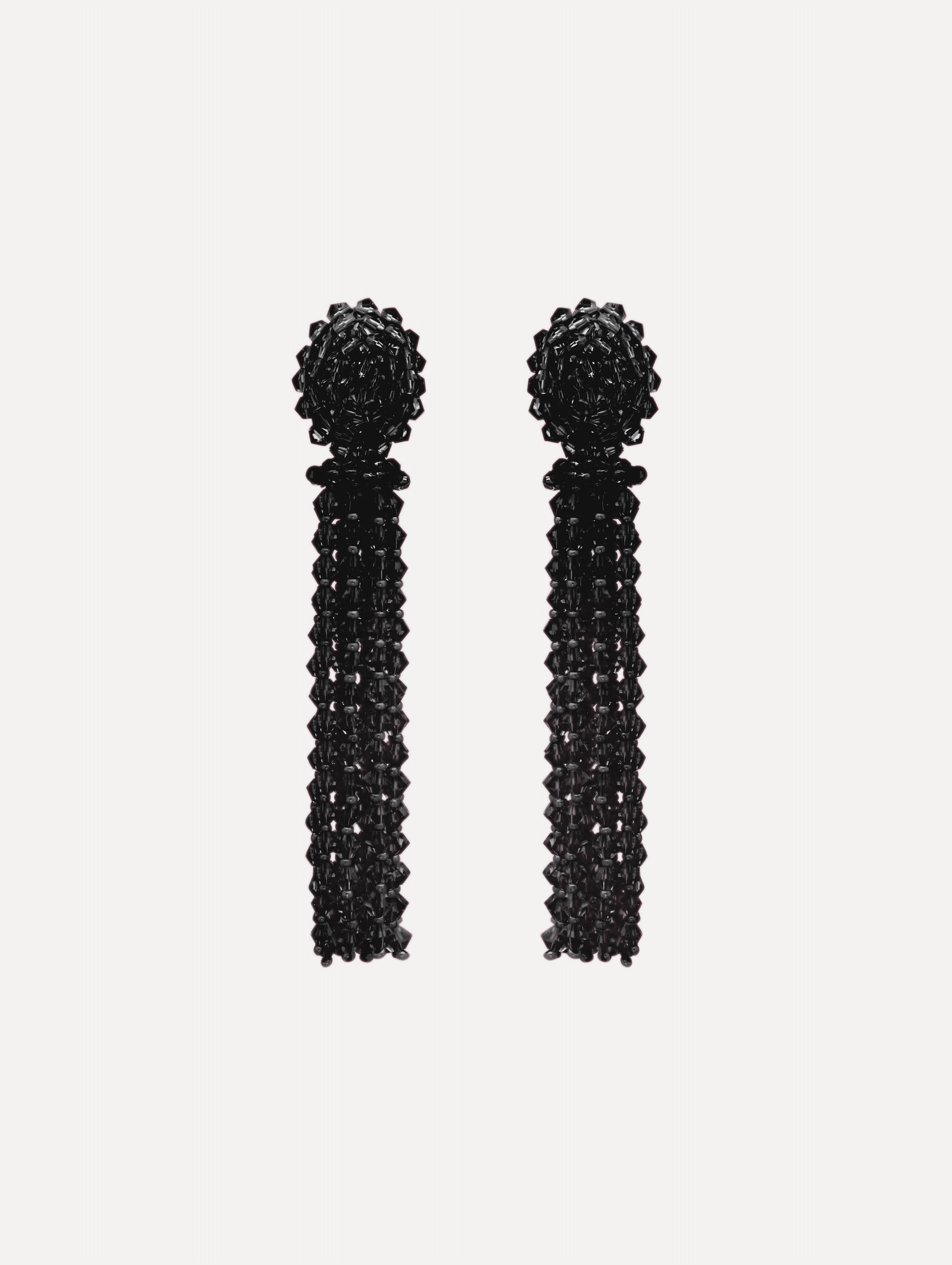 Black Tassel Clip-On Earrings featuring clustered studs and long strand fringe drops.