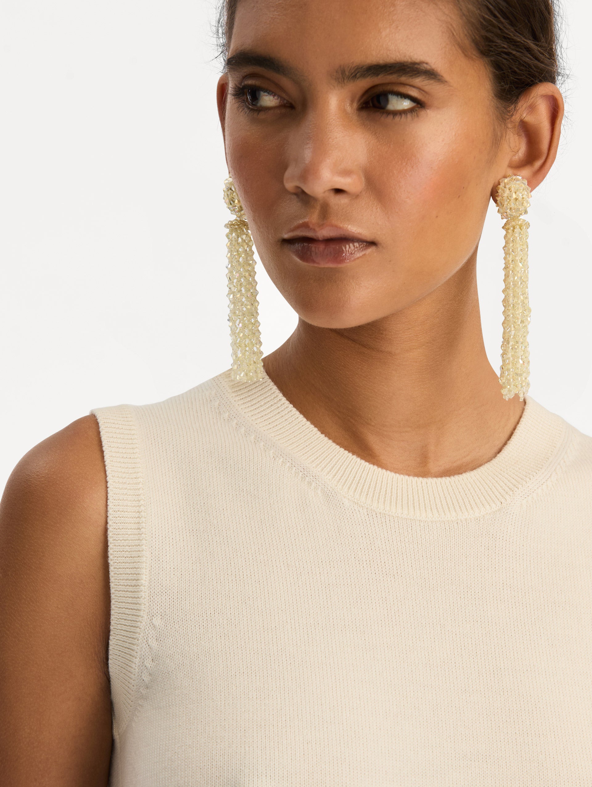 Ivory Tassel Clip-On Earrings with clustered stud top and long strand drops. Front View.