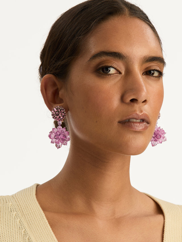 Pink Beaded Pompom Clip-On Earrings with crystal studs and floral pompom drops. Side View.