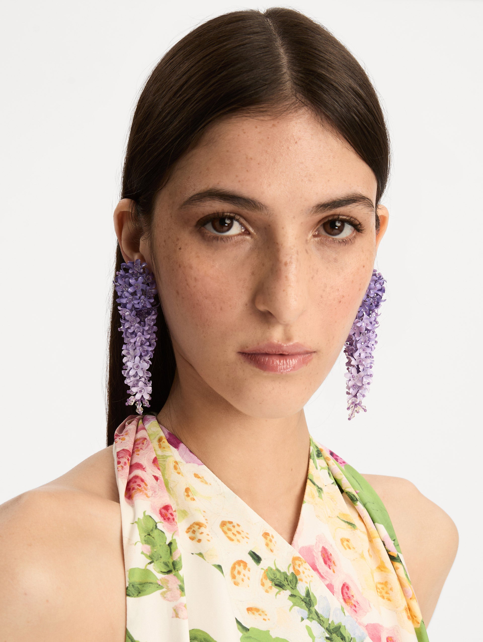 Purple Cascading Flower Clip-On Earrings with an ombré effect from deep violet to soft lavender, finished with delicate crystal accents. Front View.