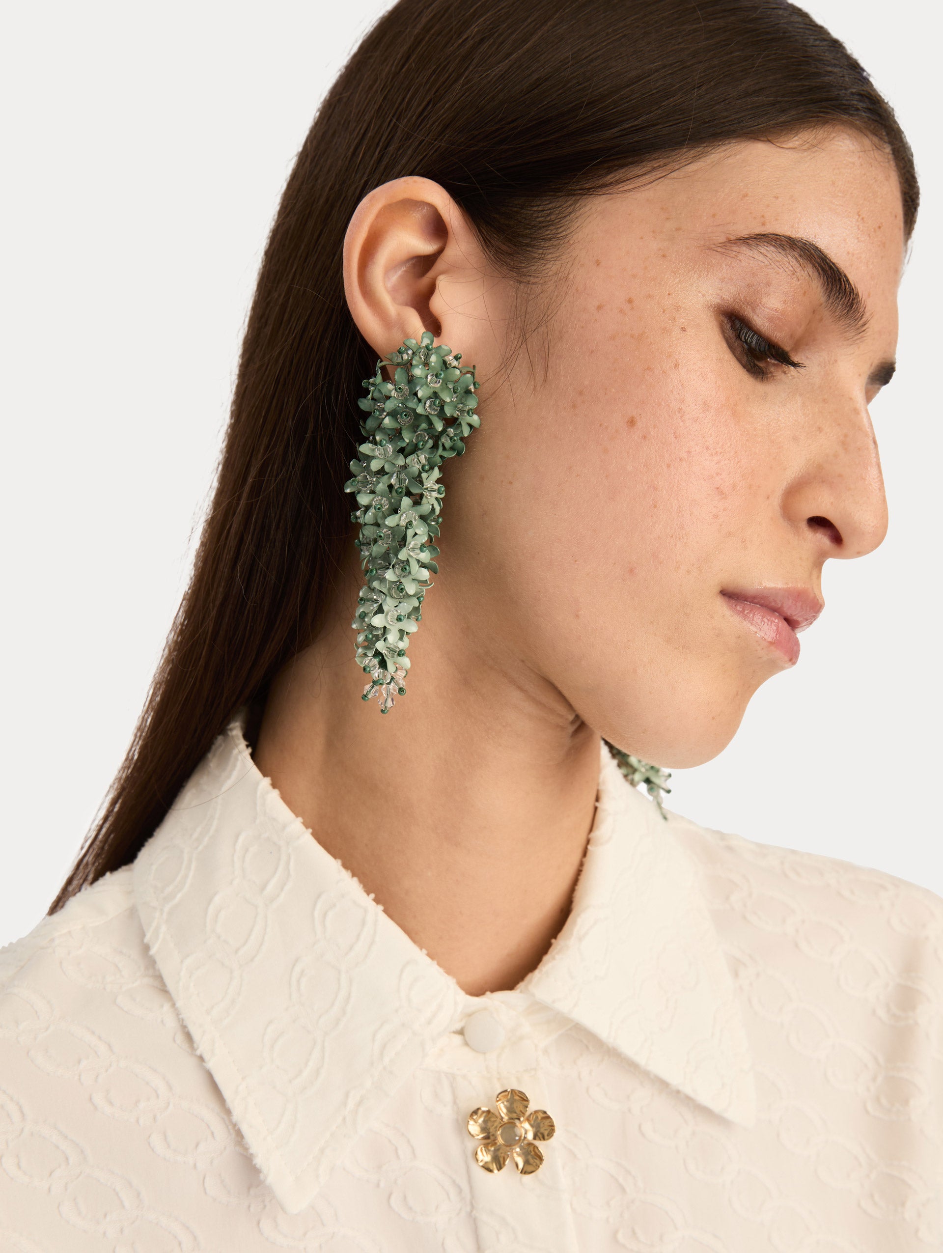 Emerald green Cascading Flower Clip-On Earrings with ombre layered petals. Front View.