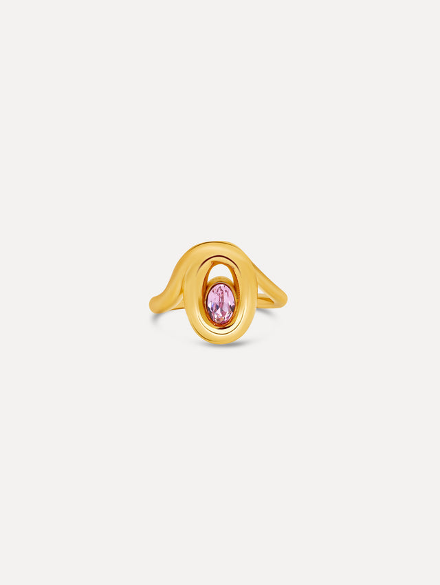 Gold Looped Oval Ring with a sculptural wave design, set with a round pink crystal at the center. Front View.