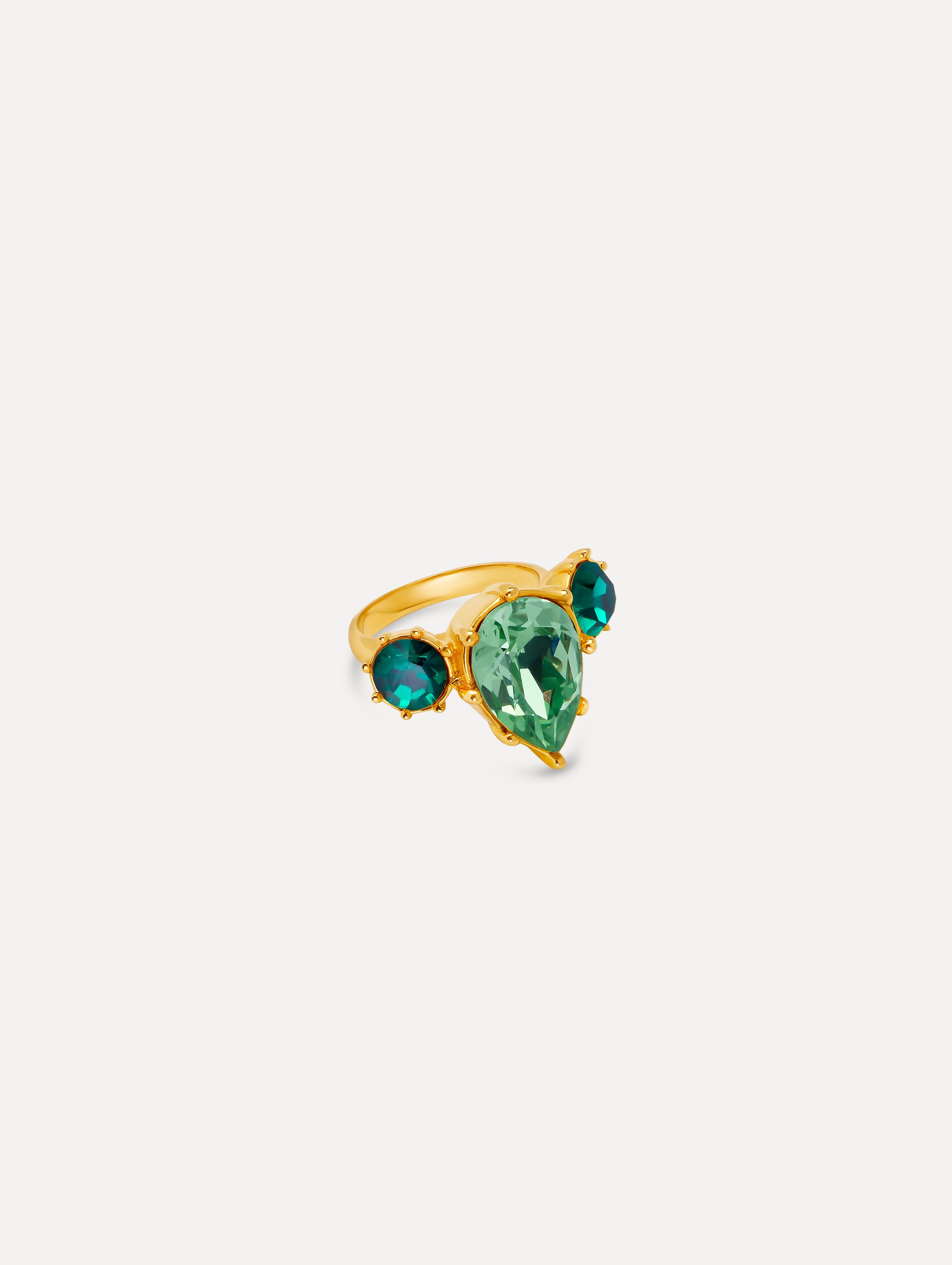Gold Faceted Crystal Ring featuring a central pear-shaped green gemstone flanked by two round emerald-green stones. 