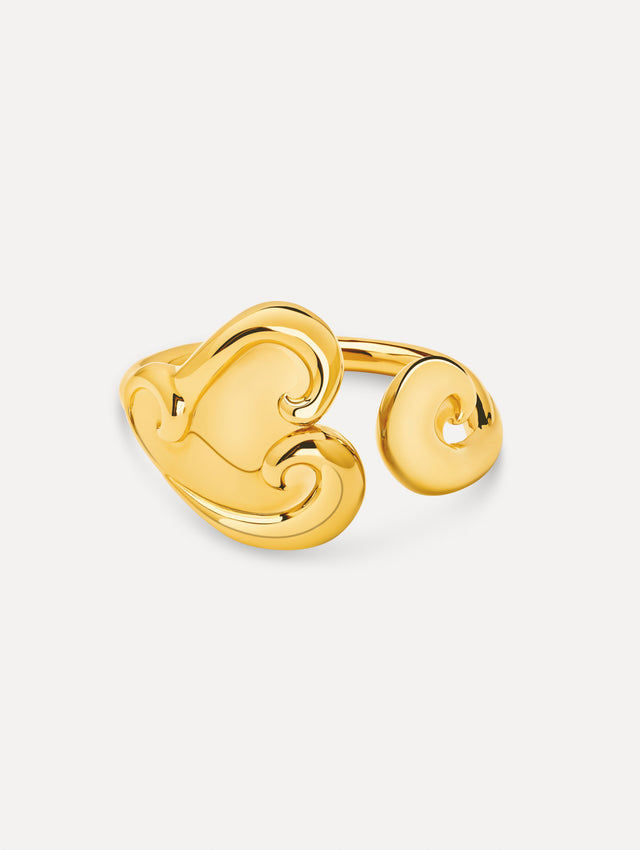 Gold Swirl Heart Cuff Bracelet featuring a sculpted heart motif with fluid, swirling details.