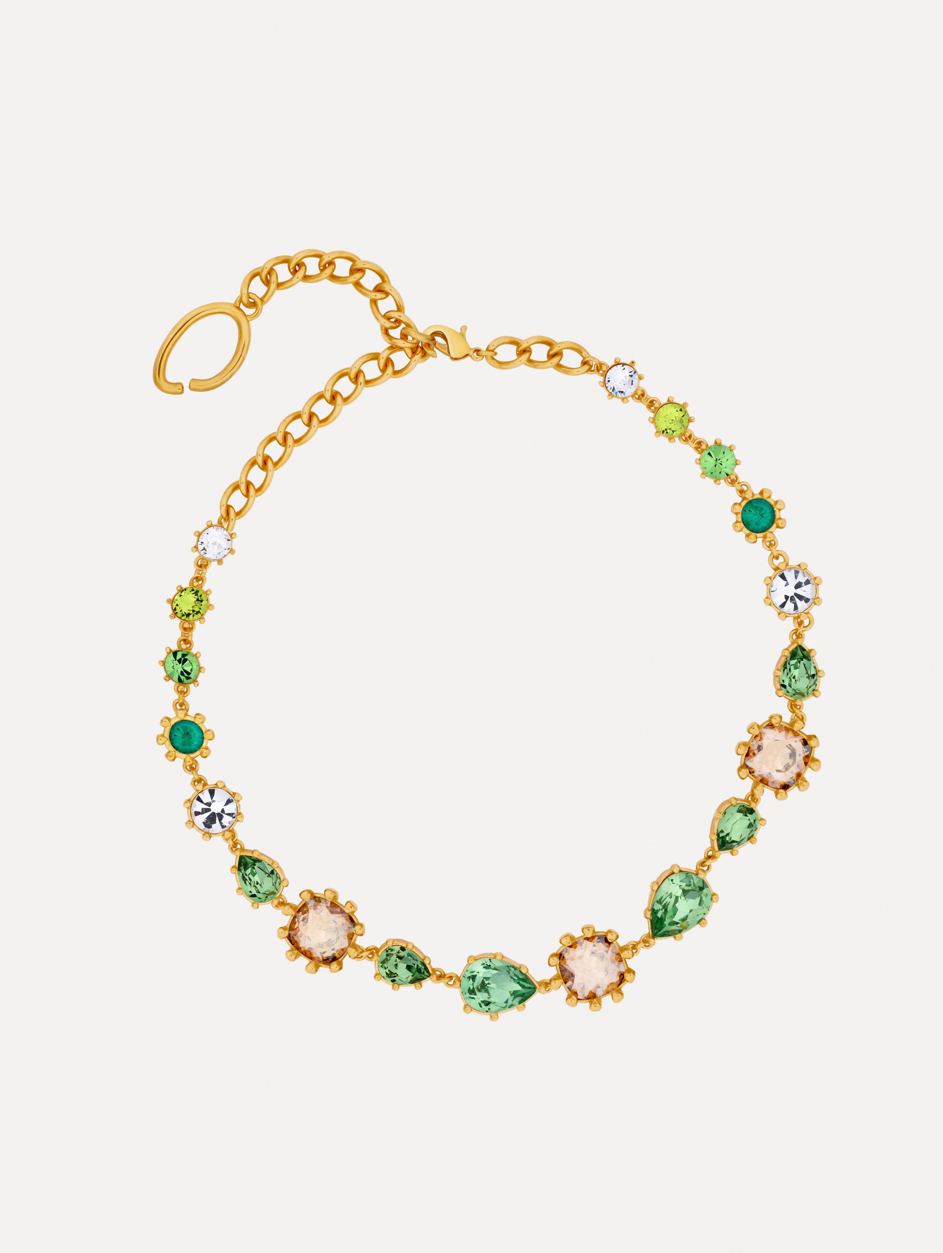 Gold Faceted Crystal Necklace featuring bezel-set crystals in green, champagne, and clear tones with adjustable chain.