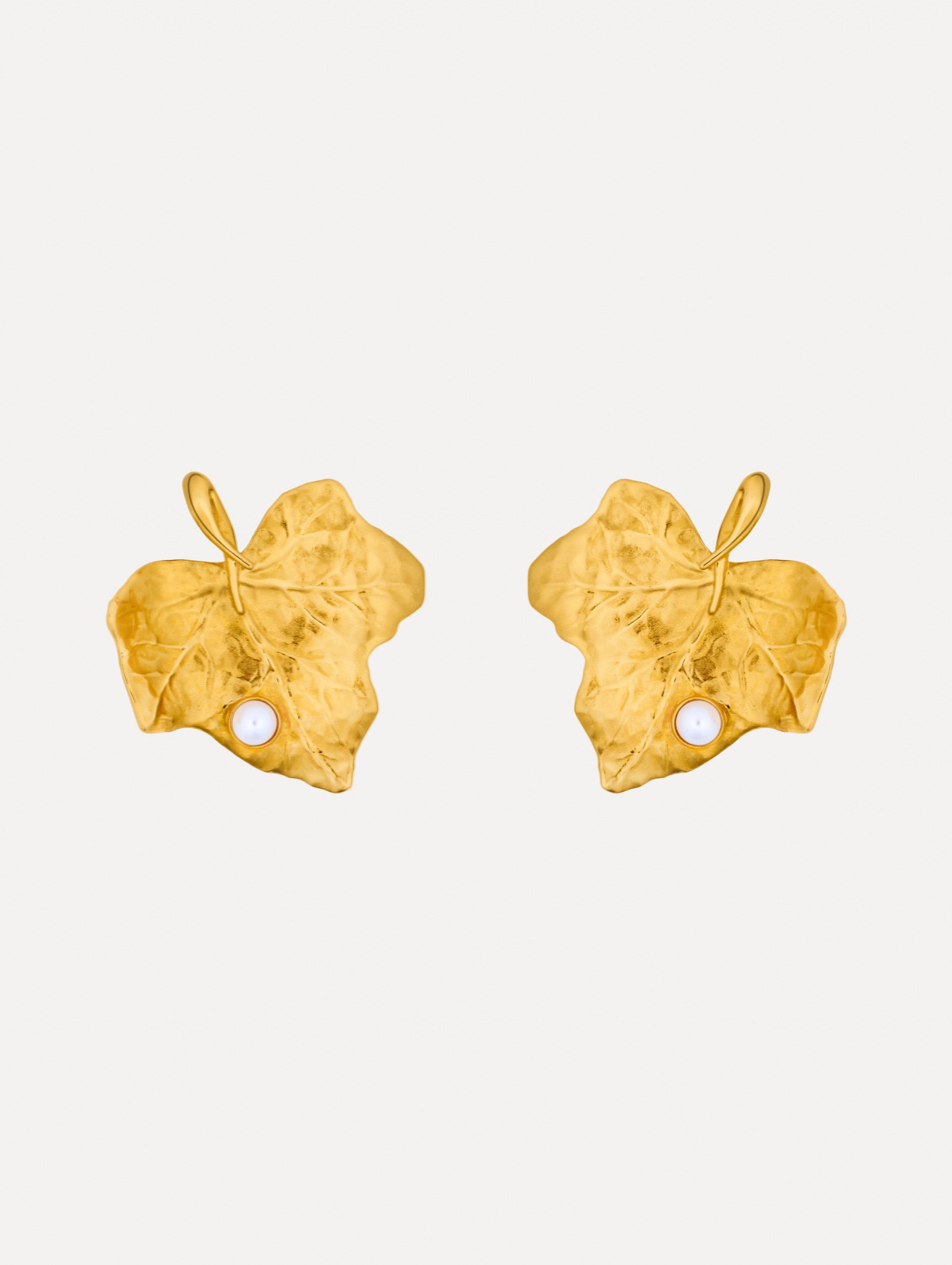 Gold Ivy Leaf Earrings featuring a textured finish and accented with a single small pearl at the base.