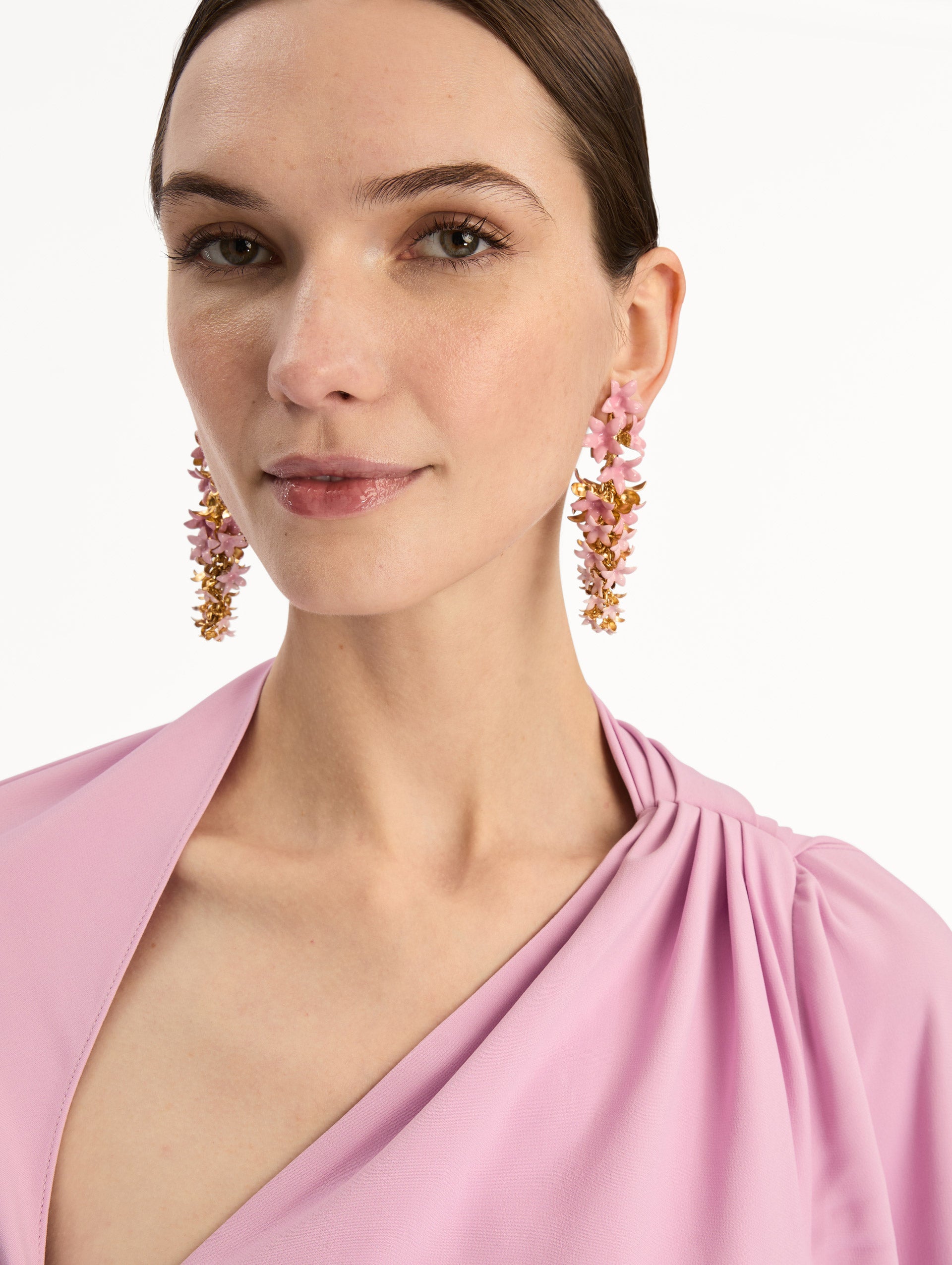 Pink Foxglove Earrings featuring layered enamel petals with gold accents. Front View.