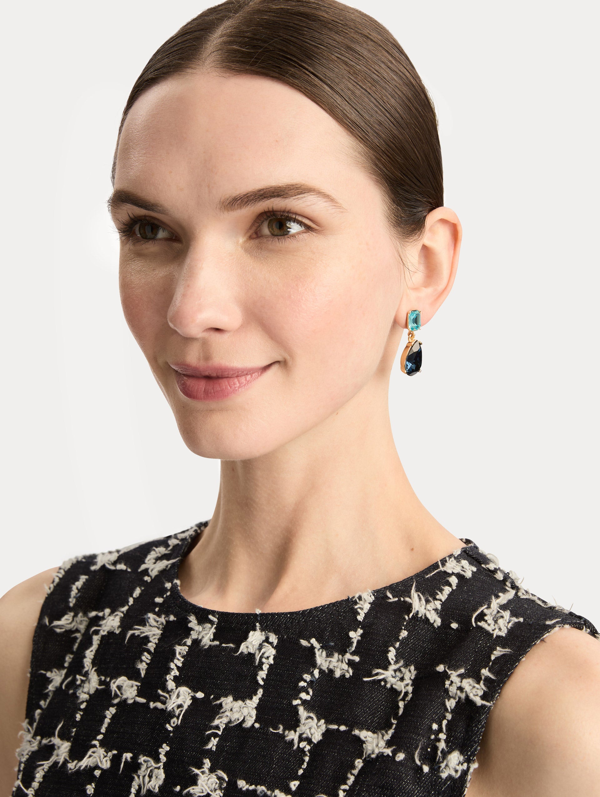 Gold Crystal Drop Earrings with square aqua studs and teardrop sapphire blue crystals. Front View.