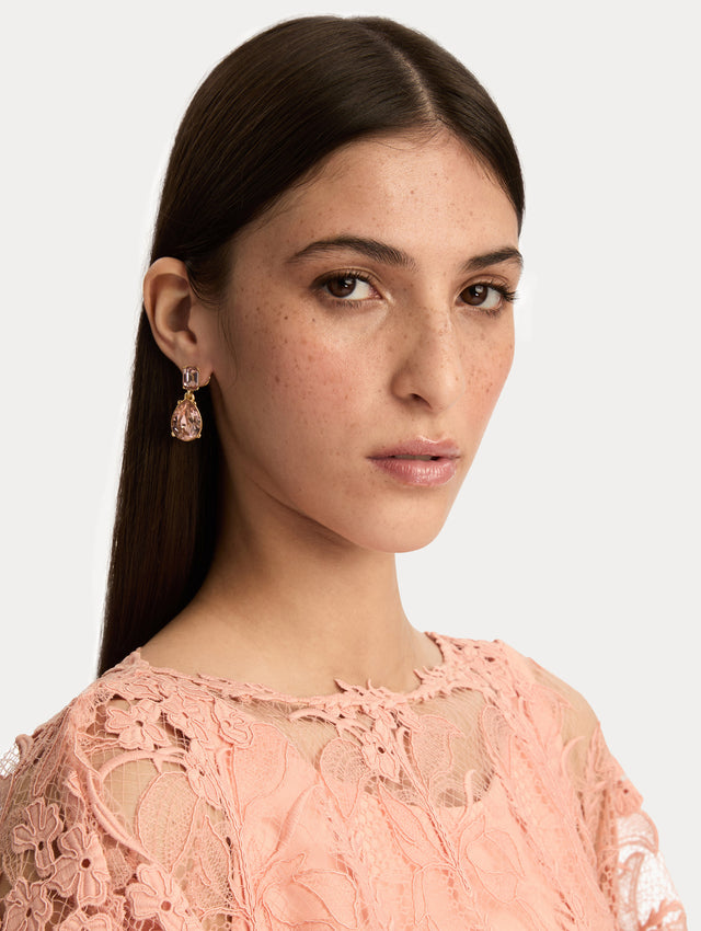 Purple Crystal Drop Earrings with rectangular lilac crystal studs and teardrop-shaped amethyst purple pendants. Front View.