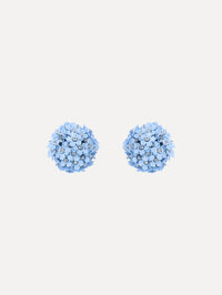 The image depicts flower pompom small earrings. Front view.