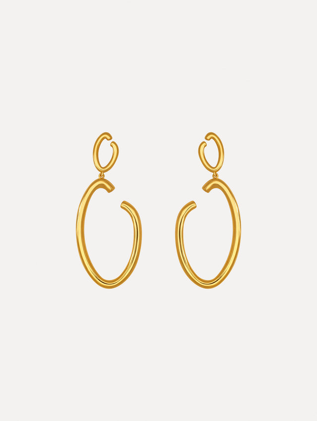 The image depicts large O logo earrings. Front view.
