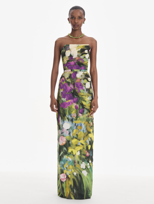 The model is wearing a strapless abstract garden faille gown. Front view.