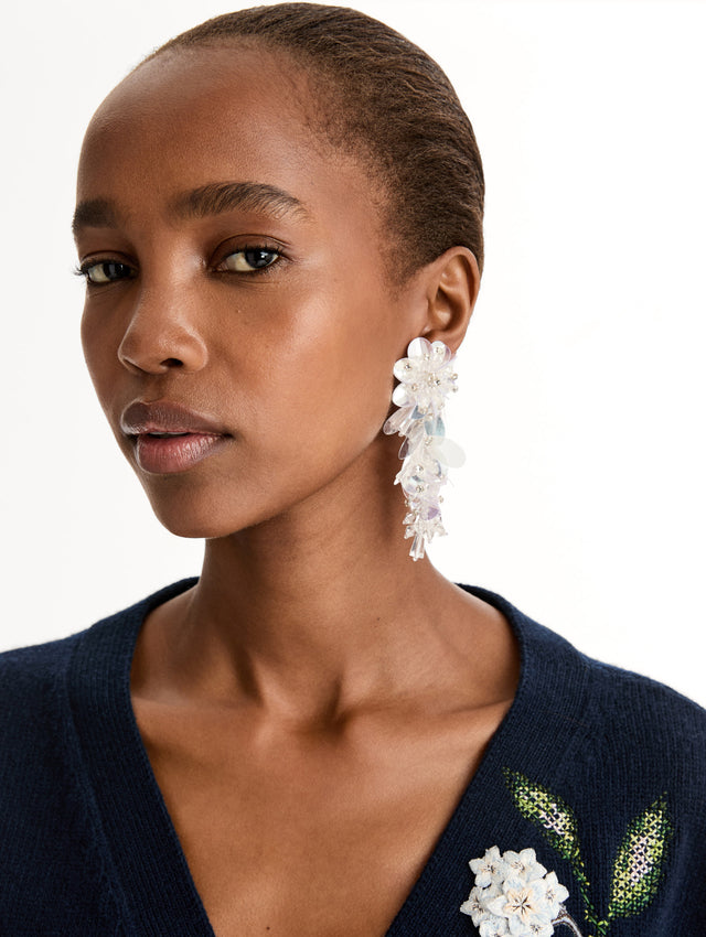 White Bouquet Drop Clip-On Earrings with clear and white iridescent cascading flower bouquet. Front View.