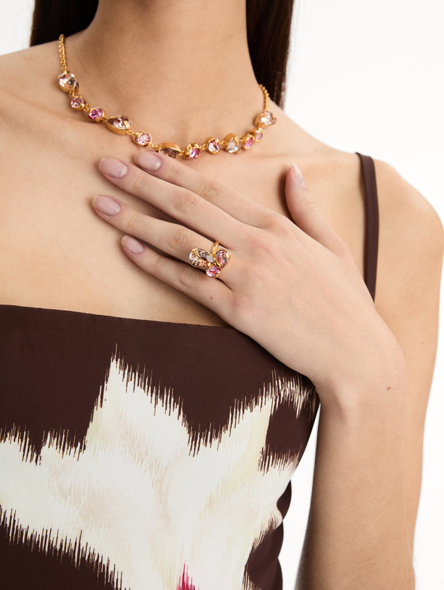 Pink Pear-Cut Cluster Ring featuring three oversized faceted stones in blush and rose-pink tones. Front View.